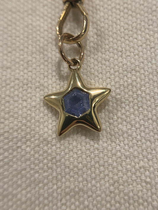 Ariana custom order - Star K. 0.60ct Hex opalescent “Fairy dust” blue sapphire in a solid 18k yellow gold Little Star, shiny finish
